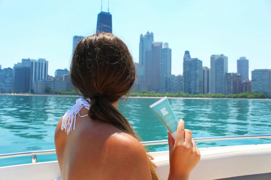 a girl holding one of the best hydrating beauty products