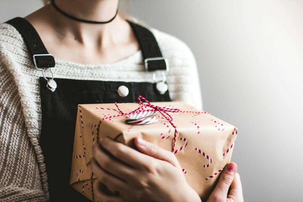 a girl holding the most gift-worthy items