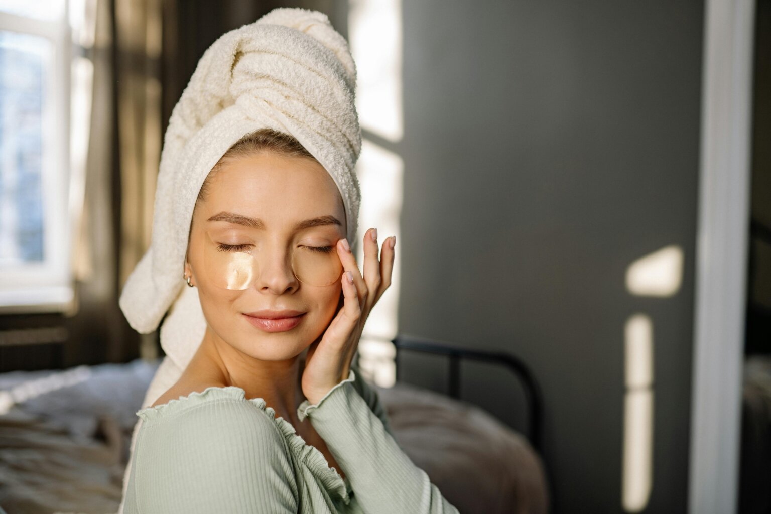 a girl using eye skincare products