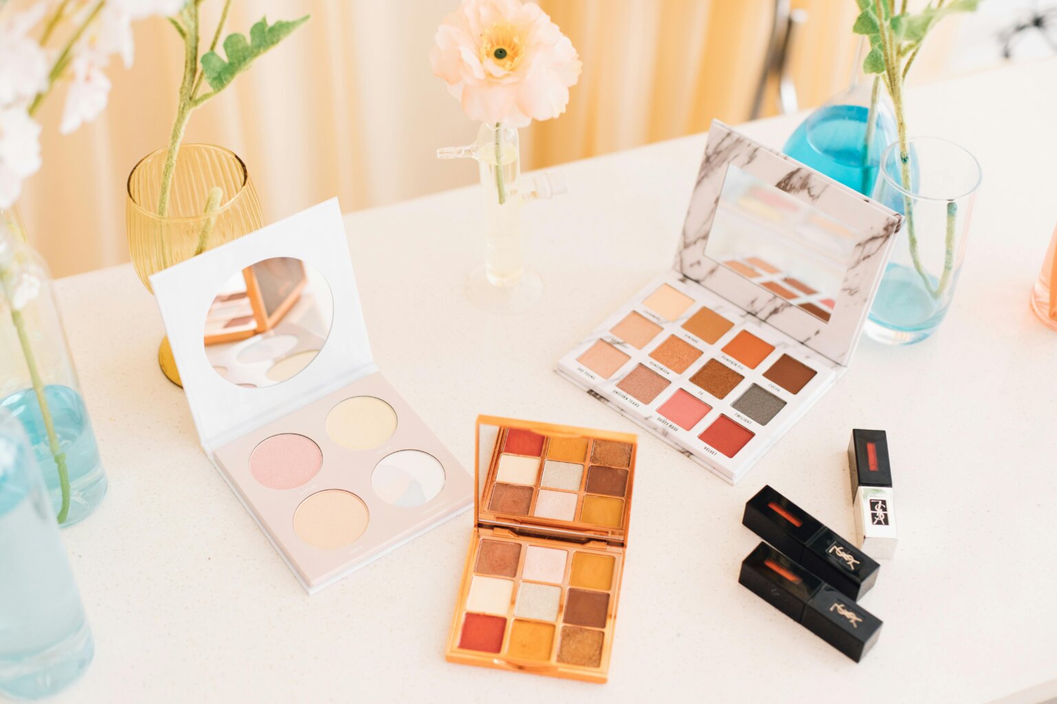 beauty products on a vanity desk